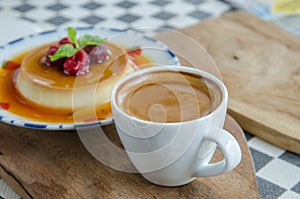 Esspresso coffee in a white cup on the table.