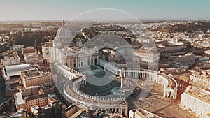 Establishing aerial shot of Vatican City. Crowded St. Peter`s Square