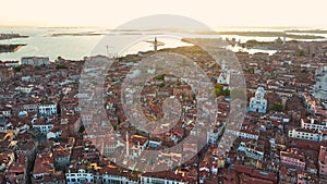 Establishing aerial view shot of Venice sunrise skyline, Venetian Lagoon, Italy