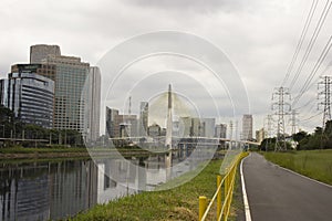 Estaiada Bridge, Marginal Pinheiros Ciclo path and skyscrapers in Sao Paulo, Brazil photo
