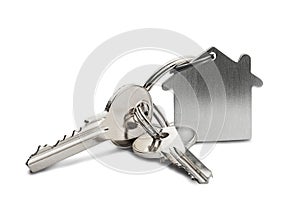 Estate concept, key ring and keys on isolated background