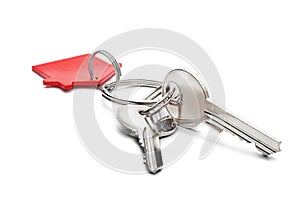 Estate concept, red key ring and keys on isolated background