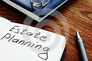 Estate planning handwriting sign on the sheet photo