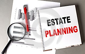 ESTATE PLANNING text written on notebook with chart