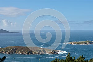 The Estela Islands in NigrÃ¡n in front of the Monteferro peninsula photo