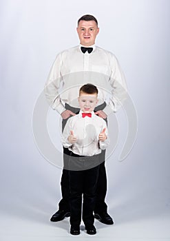 Esthete. trust and values. male fashion. happy child with father. business meeting party. little boy with dad esthete