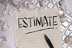 Estimate, text words typography written on paper against computer keyboard, life and business motivational inspirational
