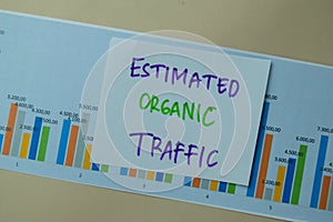 Estimated Organic Traffic write on sticky notes isolated on office desk