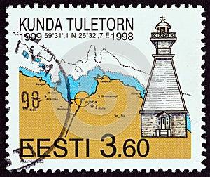 ESTONIA - CIRCA 1998: A stamp printed in Estonia shows Kunda Lighthouse and nautical chart, circa 1998.