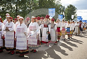 Estonian folk singers and dancers at the song festival grounds in Pirita