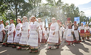 Estonian folk singers and dancers at the song festival grounds in Pirita