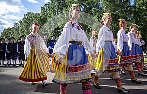 Estonian folk singers and dancers at the song festival grounds in Pirita