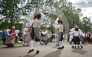 Estonian folk singers and dancers at the song festival grounds in Pirita