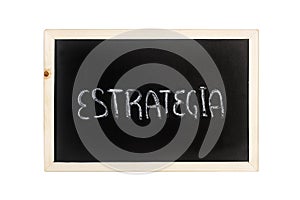 Estrategia strategy word write in chalk on a blackboard photo