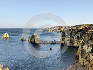 Estudiantes beach cliffs panoramic view, Lagos, Portugal. Rocky beach in, Portugal. photo