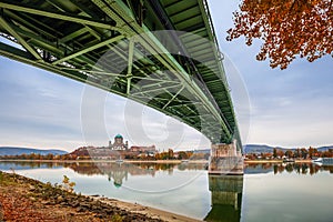 Esztergom, Hungary - Beautiful autumn morning at Esztergom with Maria Valeria Bridge, autumn leaves and foliage and Basilica photo