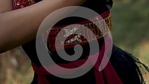 etail Shoot of Female wearing traditional dance costume with red belt