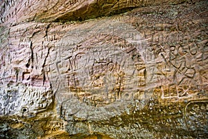 Etchings on sandstone cliff
