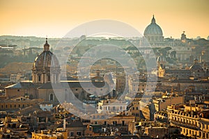 Eternal city of Rome rooftops and towers golden sunset view