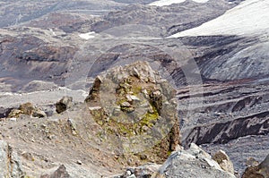 Eternal glacier and large stones in the mountains of the Caucasus