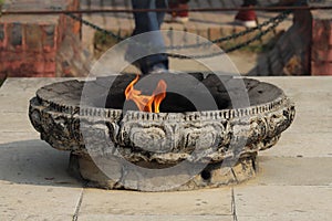 Eternal peace flame symbolized peace and harmony at Lumbini, Nepal .