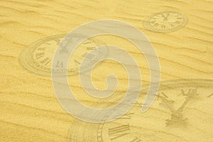 Eternity background - clock faces dissolving in sand photo