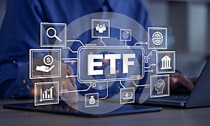 ETF,Exchange traded fund.Businessmen using a laptop and tablet with icons of ETF.Business finance concept.Stock market index fund