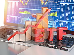 ETF exchange traded funds concept. Graph with ETF on the laptop photo