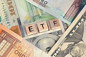 ETF Investment index funds concept with business background and banknotes