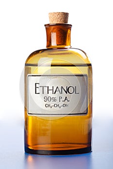 Ethanol, pure ethyl alcohol in bottle photo