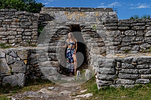 Ethereal Journey: A Young Beauty\'s Sojourn through Xcambo Mayan Ruins in Telchec, Yucatan, Amidst a Caribbean Oasis photo