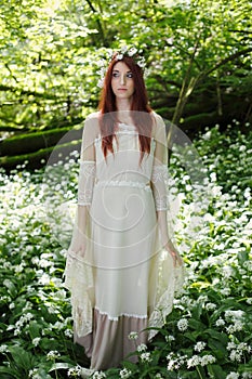 Ethereal woman in fantasy forest