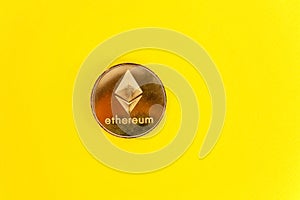 Ethereum, ETH, Crypto Coin on yellow background