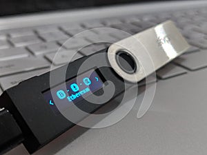 Ethereum Hardware Wallet On Laptop Keyboard