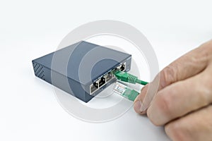 Ethernet switch box port on a white
