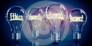 Ethics, honesty, integrity, respect - shining four light bulbs - 3D illustration