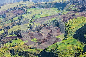 View of farms and a village in the Ethiopian highlands photo