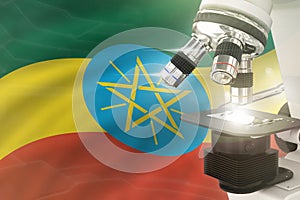 Ethiopia science development concept - microscope on flag background. Research in medicine or nanotechnology 3D illustration of