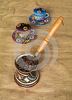 Ethiopian harar cofee beans in kettle photo