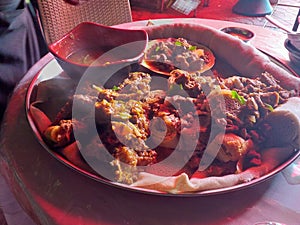 Ethiopian non-vegetarian food-Injera with wot made with mutton spiced butter and other stuffs