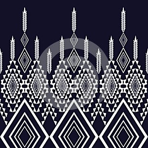 Ethnic abstract ikat art. Seamless pattern in tribal, folk embroidery, and Mexican style.