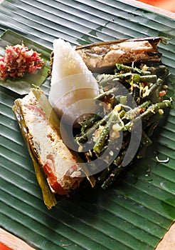 Ethnic asian food, fish dish with rice