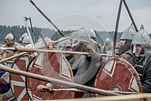 Ethnic Festival of Ancient Culture. Reconstruction of medieval warriors of knights in battle