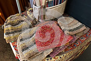 Ethnic hats and backbag in outdoor market