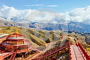 Ethnic house on mountain top at Pingshan Lake Valley