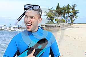 Ethnic man smiling from a beach resort
