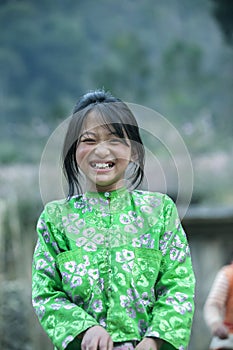 Ethnic minority children is smiling at Lung Cam village