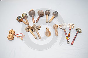 Ethnic musical instrument. Rattle of seeds with a handle