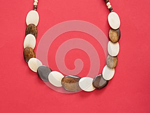 Ethnic necklace on red