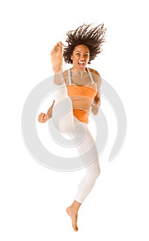 ethnic sports karate woman jumping and kicking